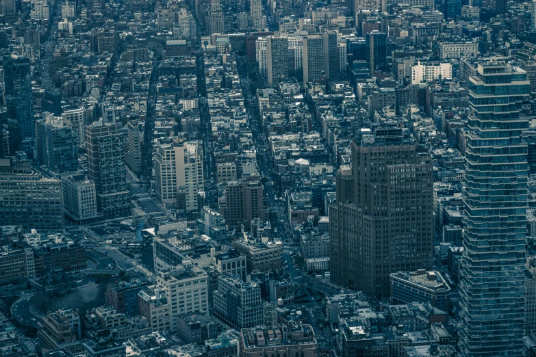 an aerial view of tall buildings and skyscrs