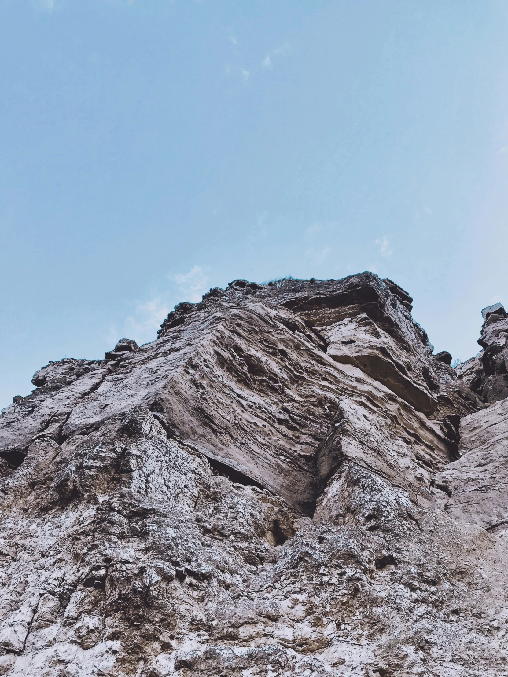 large rocks and some water on the side