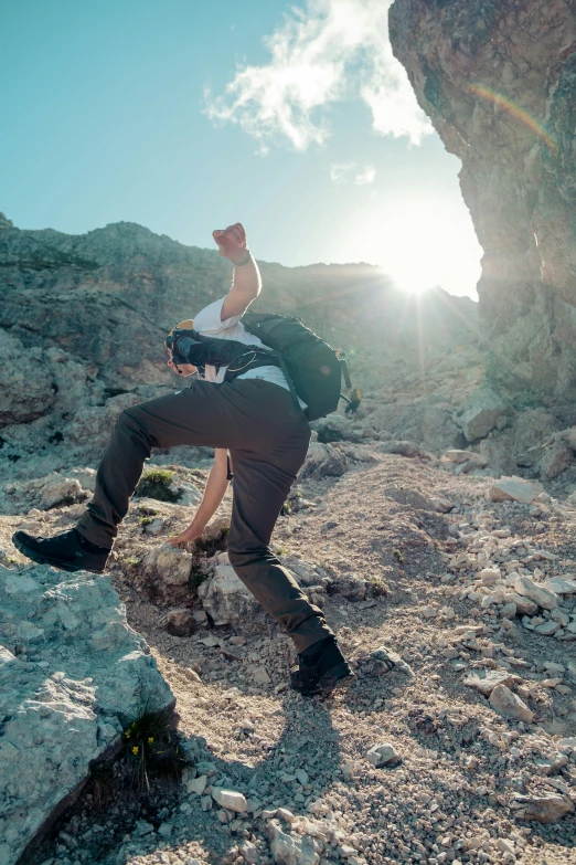 a woman takes a po of herself while standing at a mountain