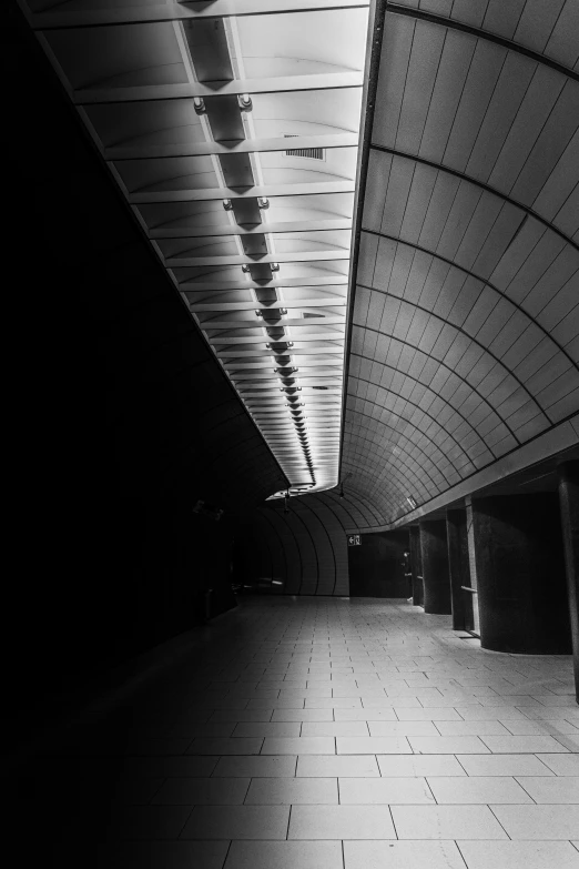 black and white pograph of tiled floor and walkway