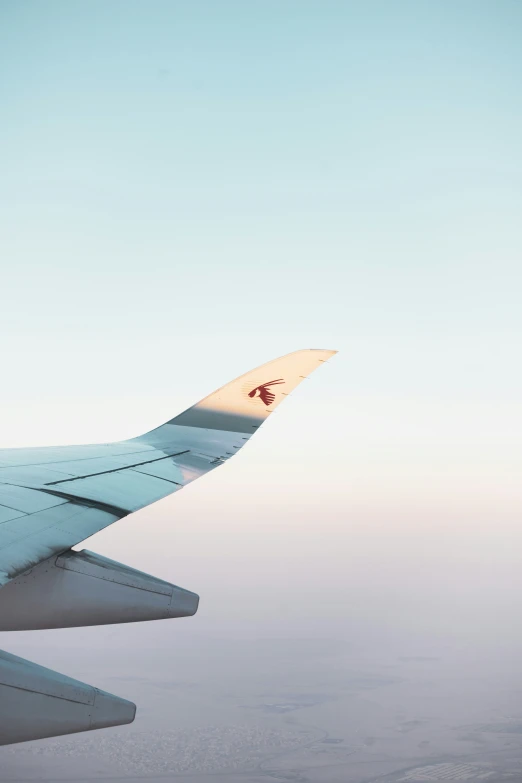 a wing view of an airplane in flight