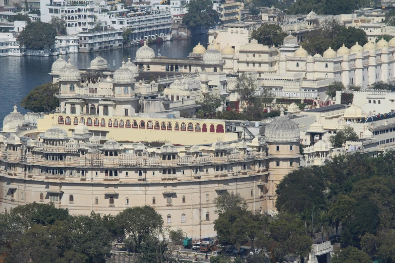 a large building with multiple balconies on top of it