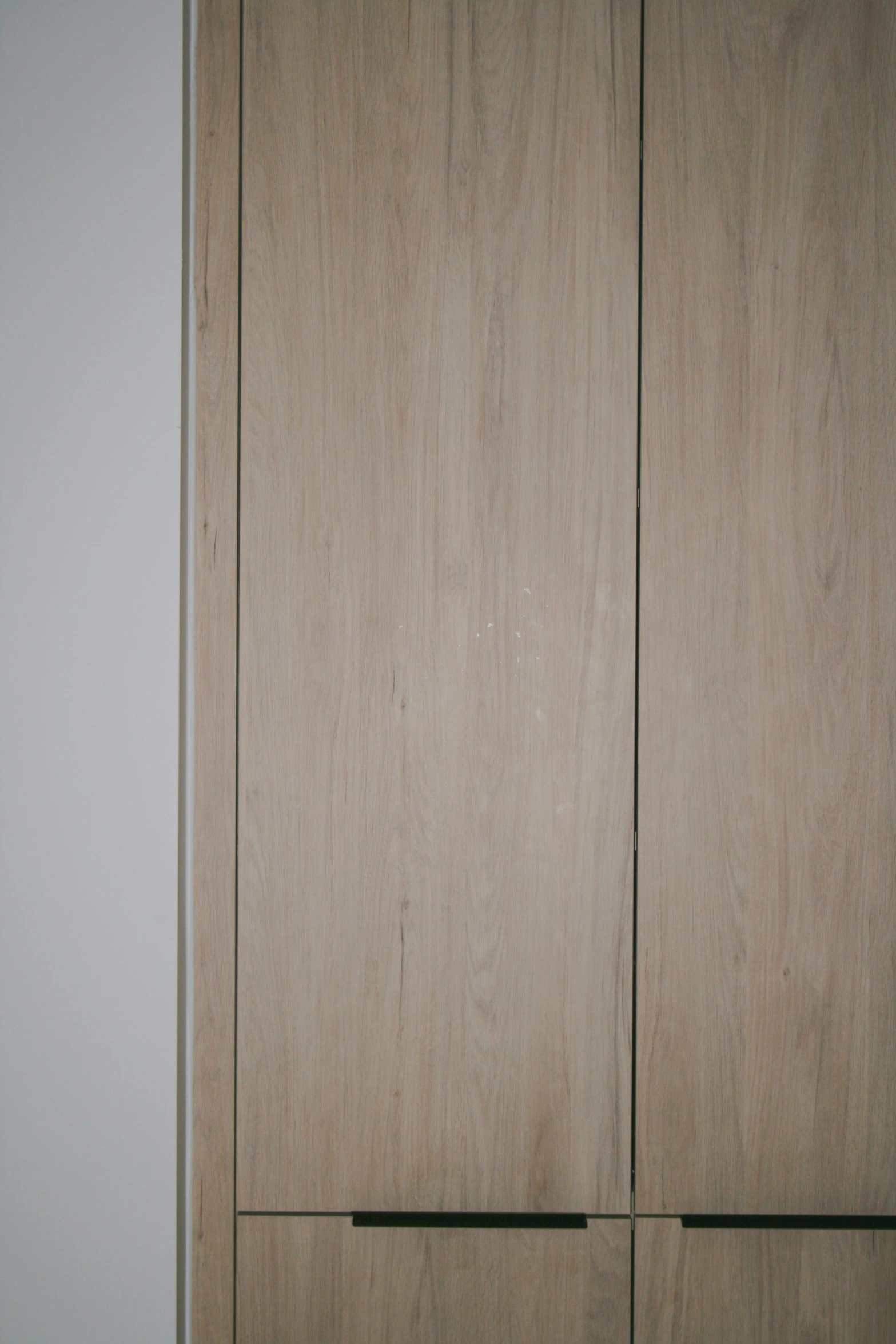 this is a close up image of wood cupboards