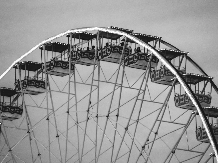 an amut ride with large ferris wheels on top