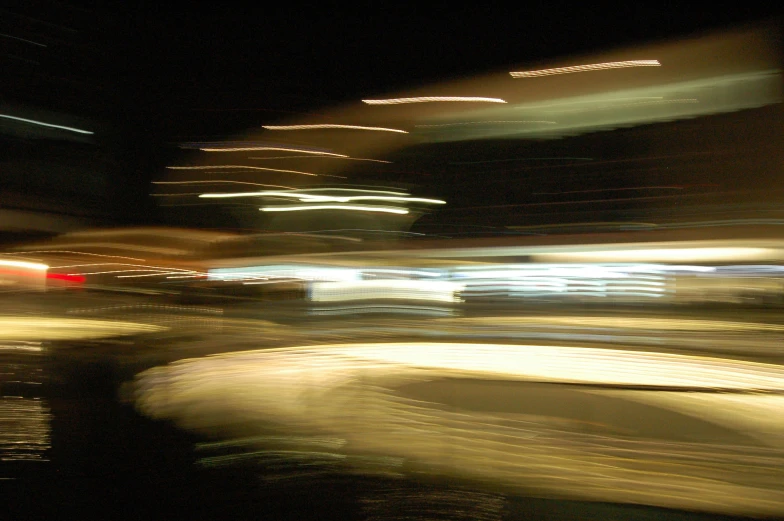 a blurry pograph of street lights and cars