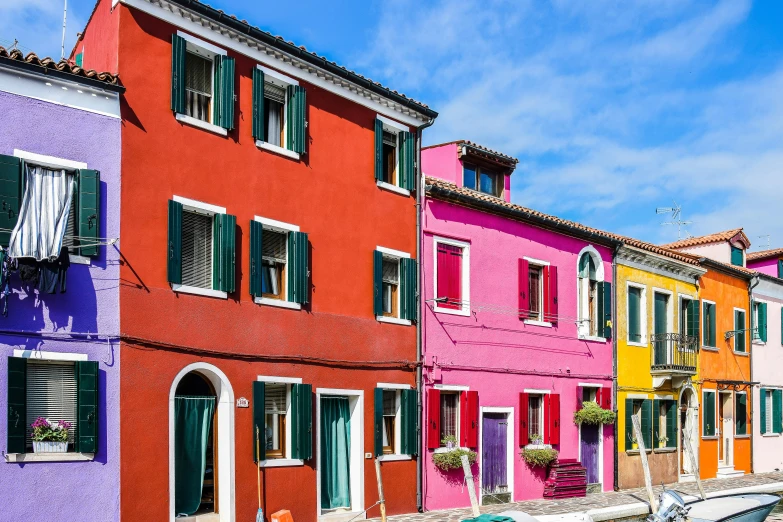 a row of colorful houses that appear to be painted in different colors