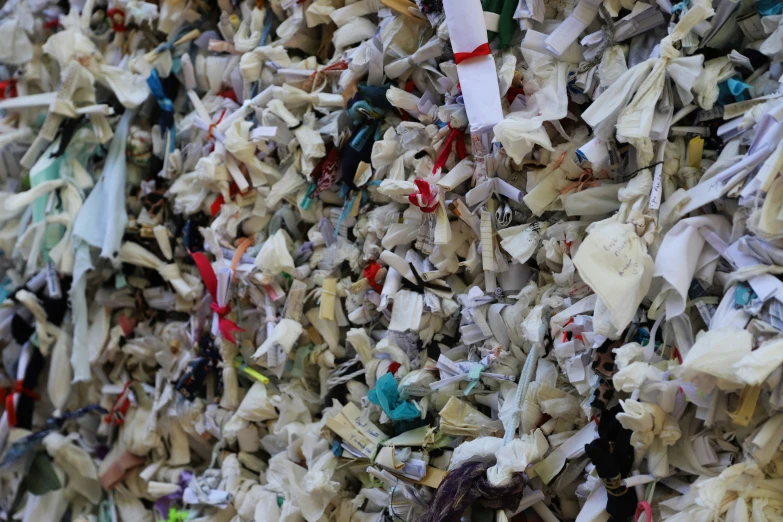 an oversize pile of different colored, shredded objects