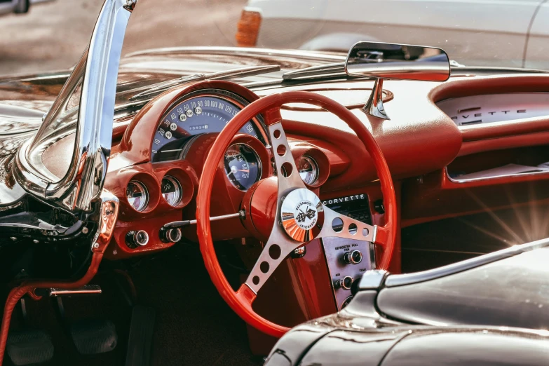 an interior of an old car, including the dashboard and interior