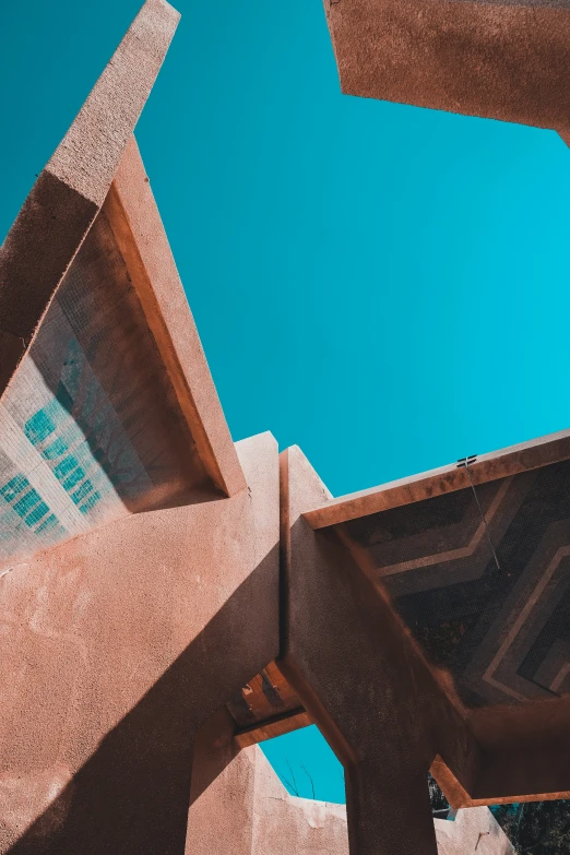 the architecture is designed and made by stone, with blue skies overhead