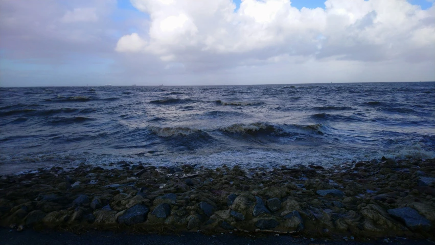 a view of the ocean from the shore