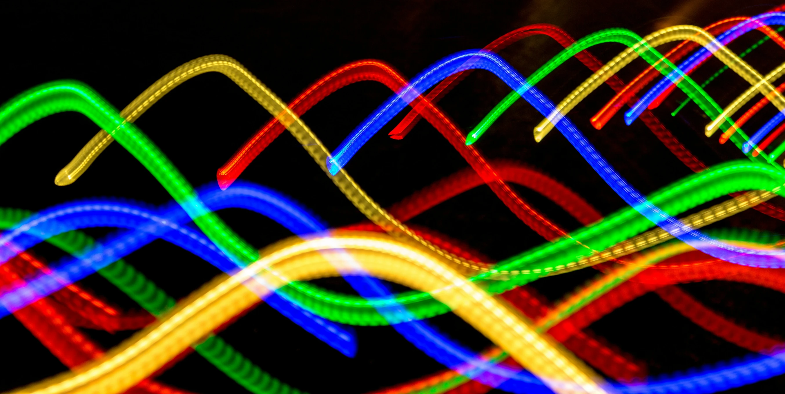 an image of colorful lights being viewed from the ground