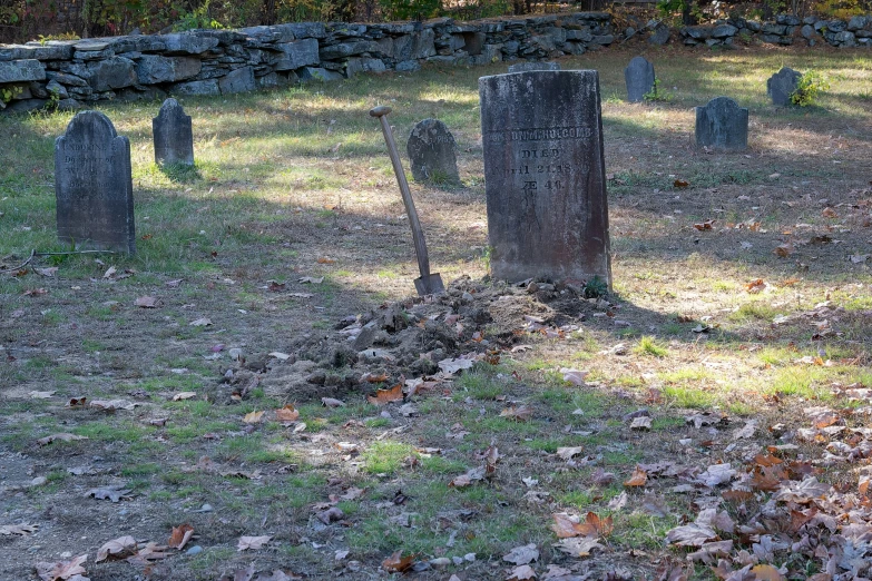 the graveyard is set out on the grass