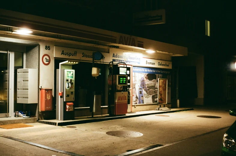 a picture of a business at night in the dark