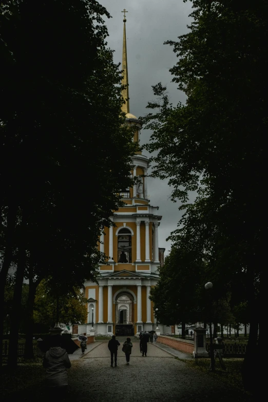 a building with people walking around in the street