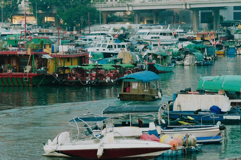 a body of water with many small boats in it