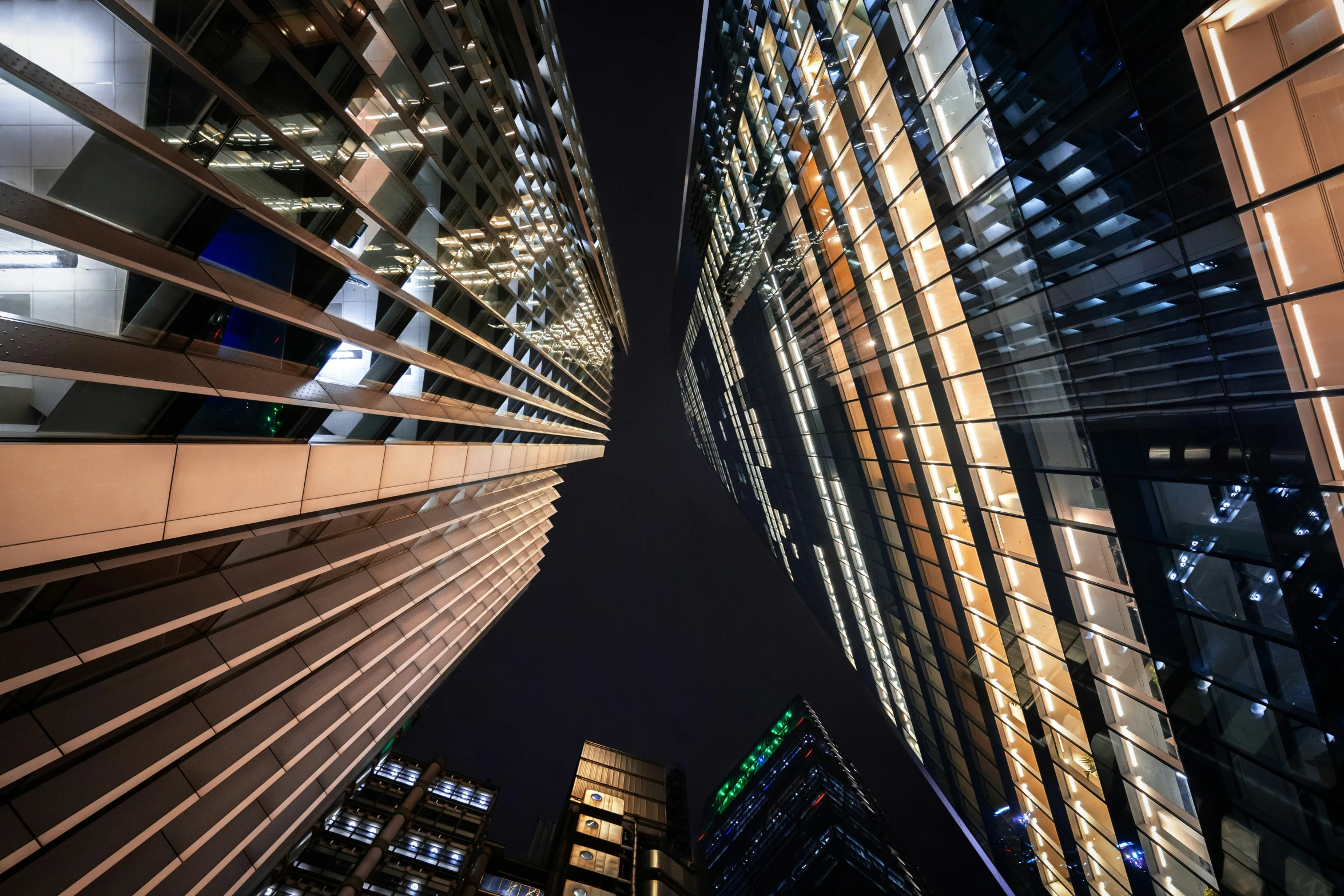 looking up at some tall buildings from a high vantage