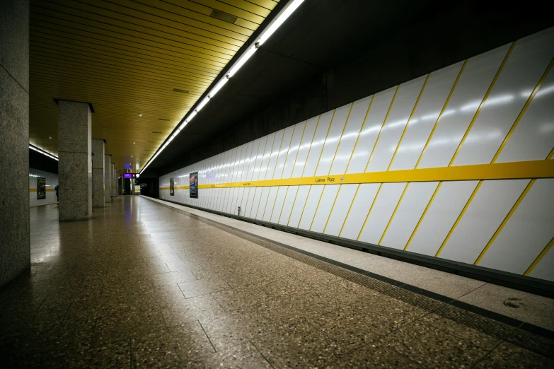 a large white wall next to the floor