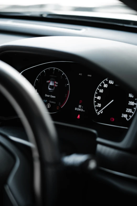 the dashboard of a car is showing and arrow pointer