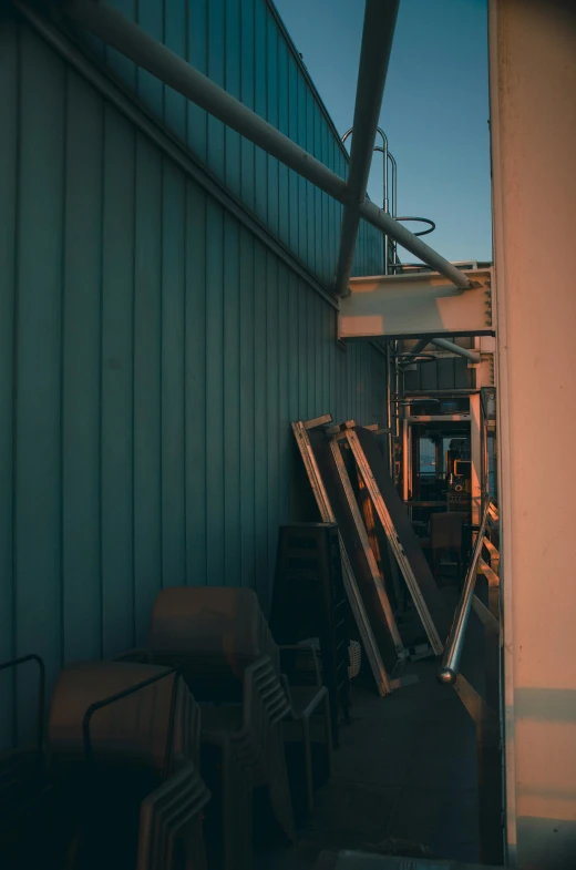 a long building with stairs and some glass