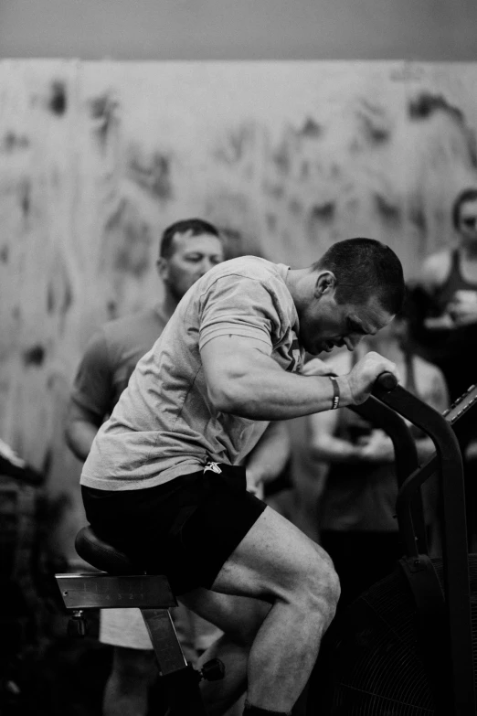 the man is exercising on an exercise machine