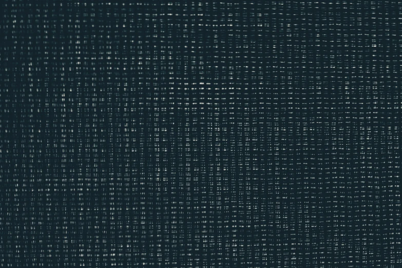 a computer screen with many small white dots