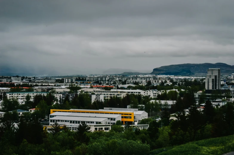 the city below the mountains is a storm brewing