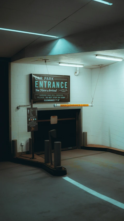 a subway station entrance with large advertit sign