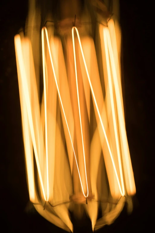 a lit image with light sticks in the dark