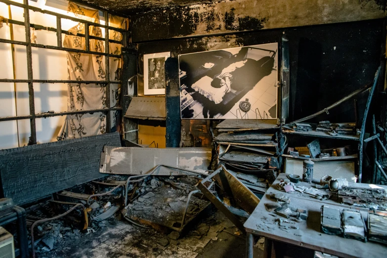 the wall and ceiling of an old building are burned