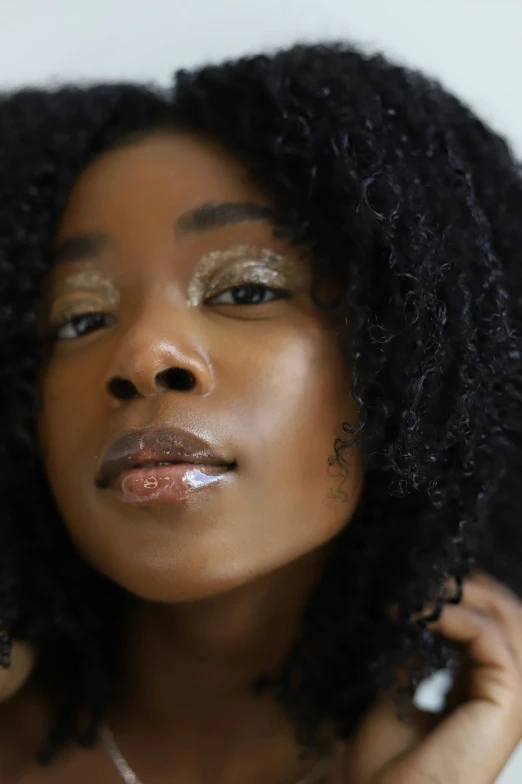 close up po of woman with natural hair