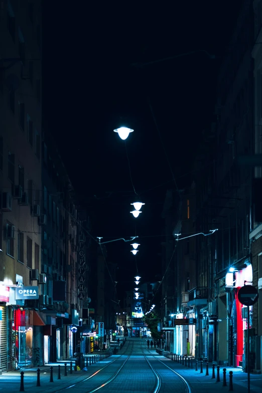 dark street in a city at night time