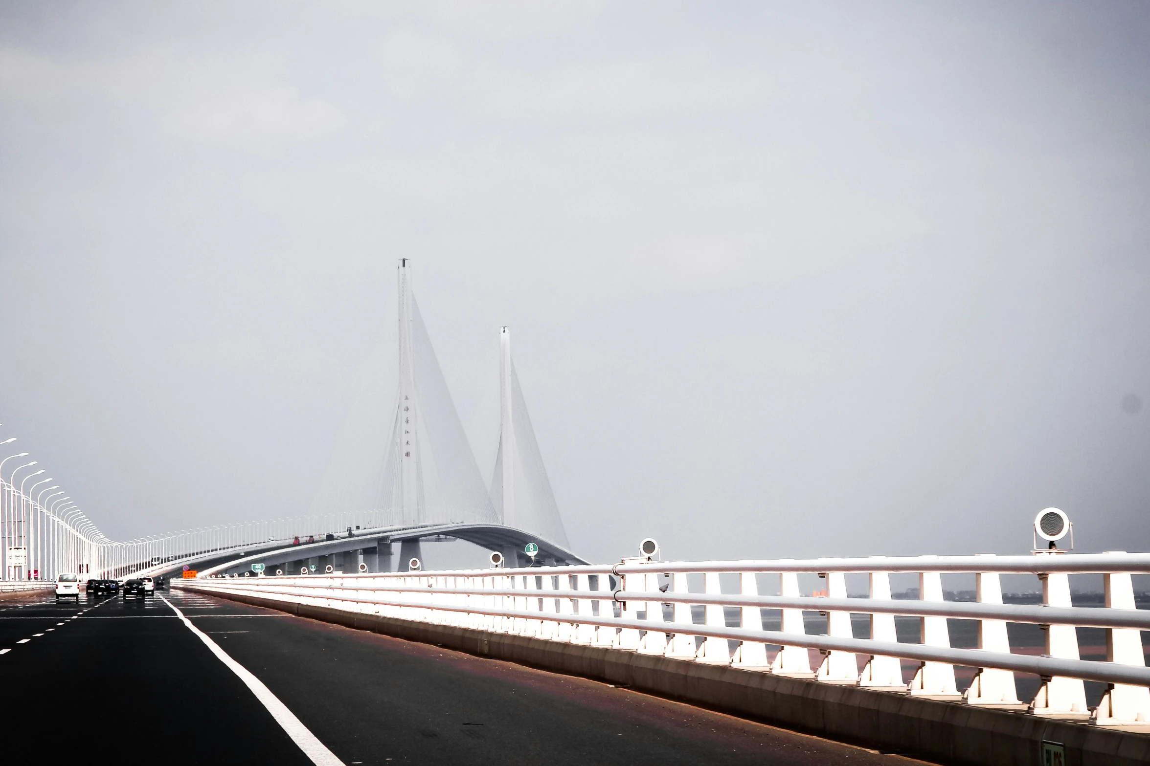 the bridge is surrounded by many light traffic