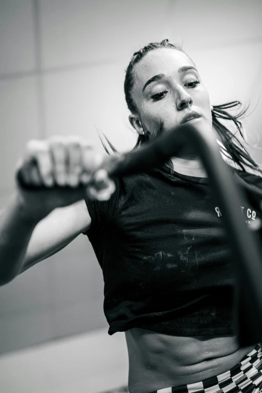 a woman with an arm chain that is near her face