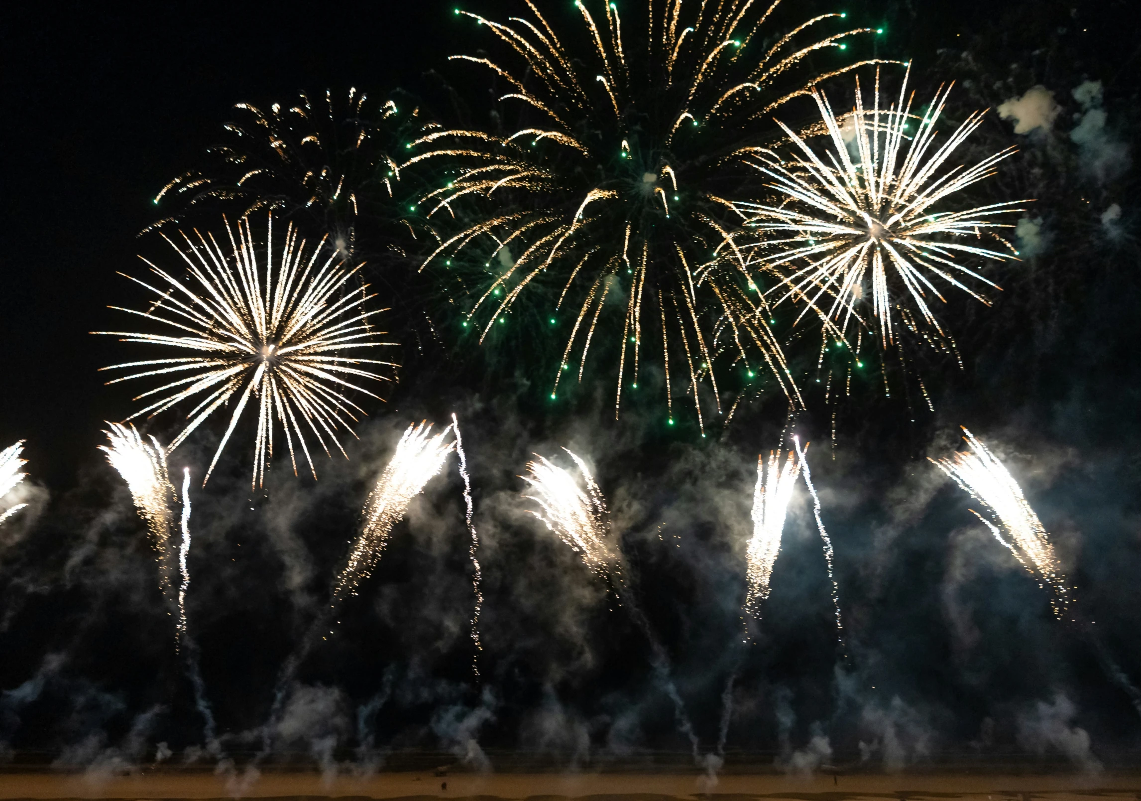 a large fireworks display on a dark night