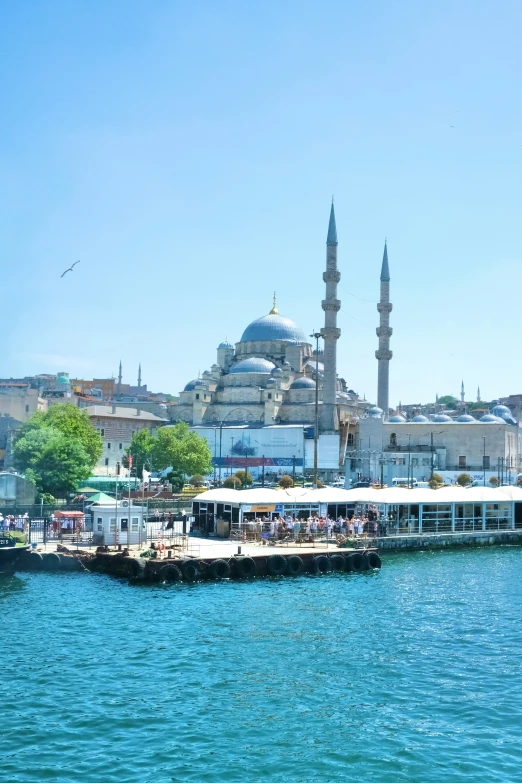 the blue water is surrounded by many buildings