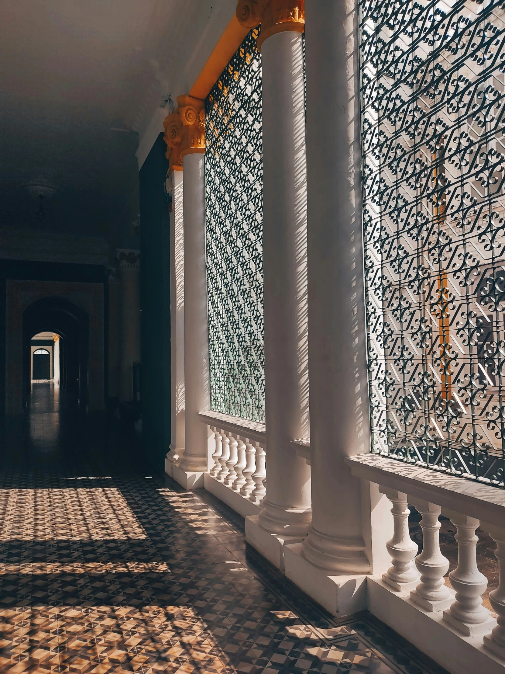 a long narrow hall leading into a hallway