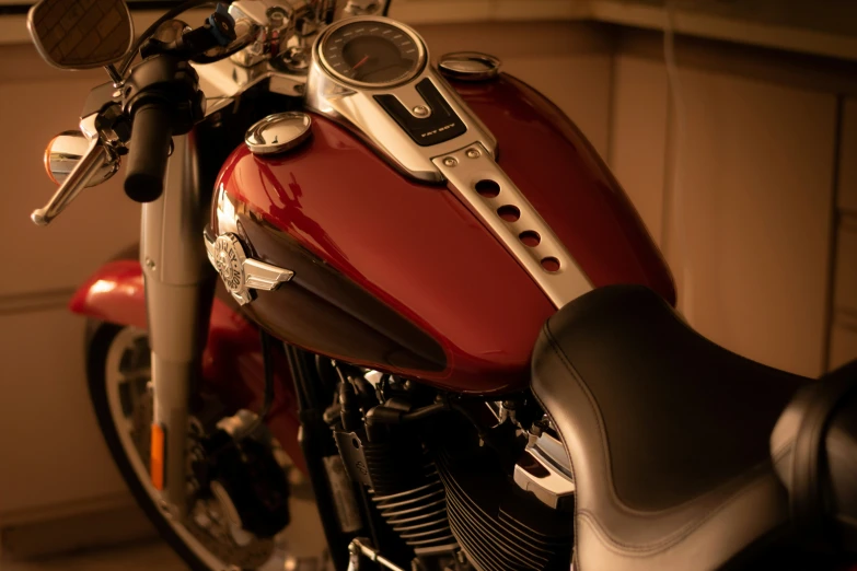 a close up of a red and black motorcycle