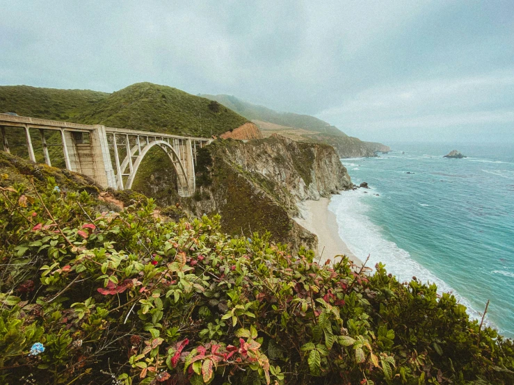 a very scenic view of the bridge over the water