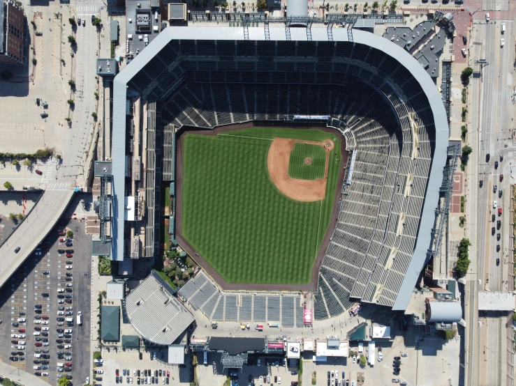 an aerial po of a baseball stadium with green grass and dirt