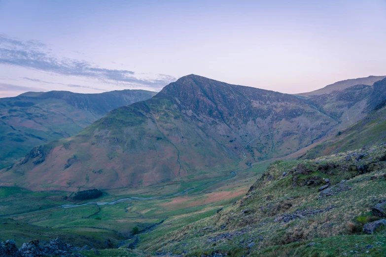 the mountains are covered in thick vegetation