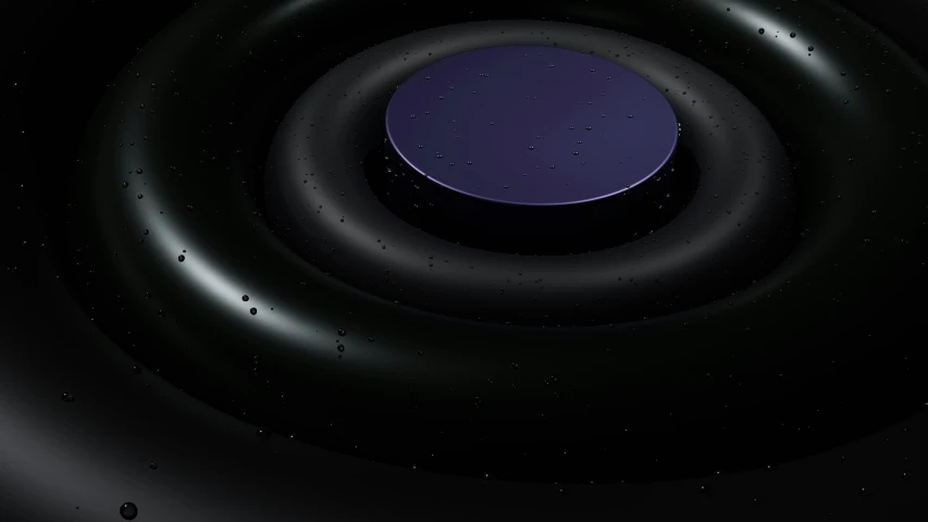 an image of a black object with bubbles in it