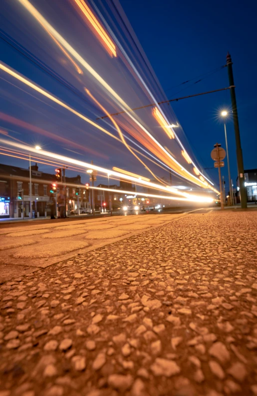 a blurry view of the light trails from an intersection