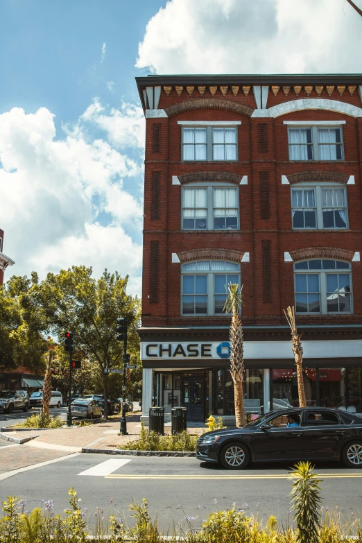 a brown brick building on a city street