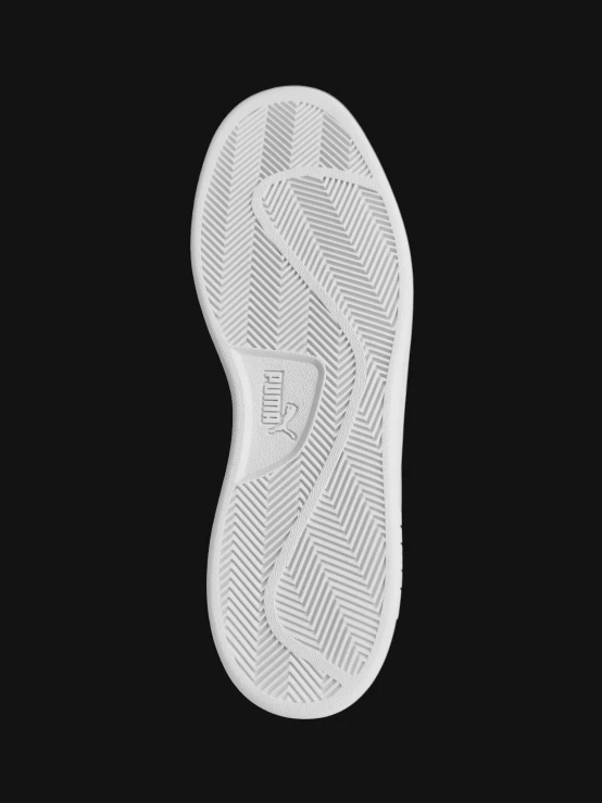 the underside view of a shoe on a black background