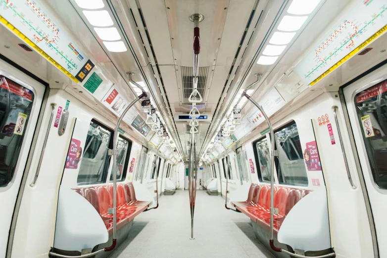 an empty train with a passenger compartment down it