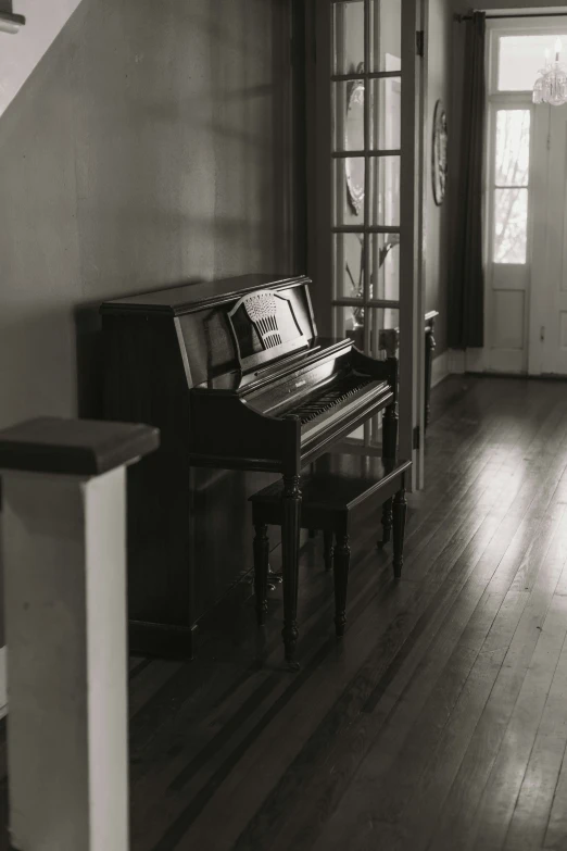 the piano is in the middle of a large room