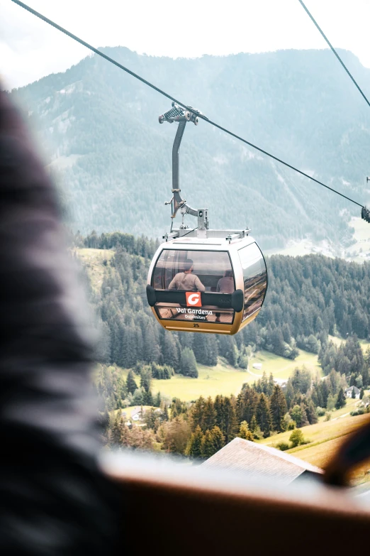 the gondola car is coming down the hill