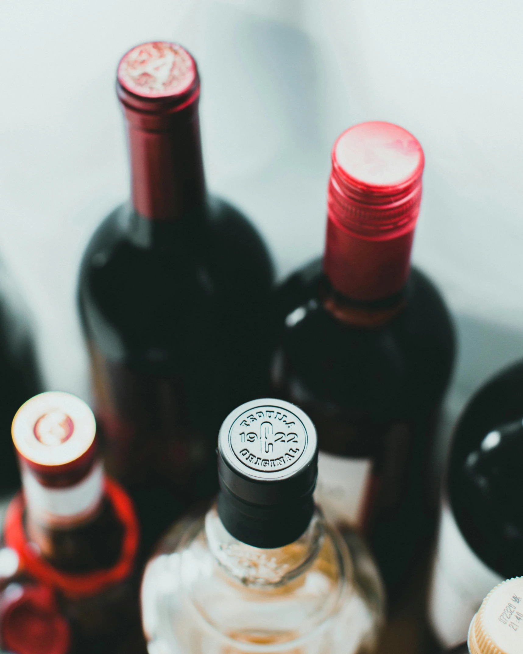 various bottles are on a table near each other