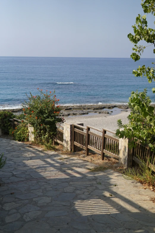 walkway to the beach leading up towards the water