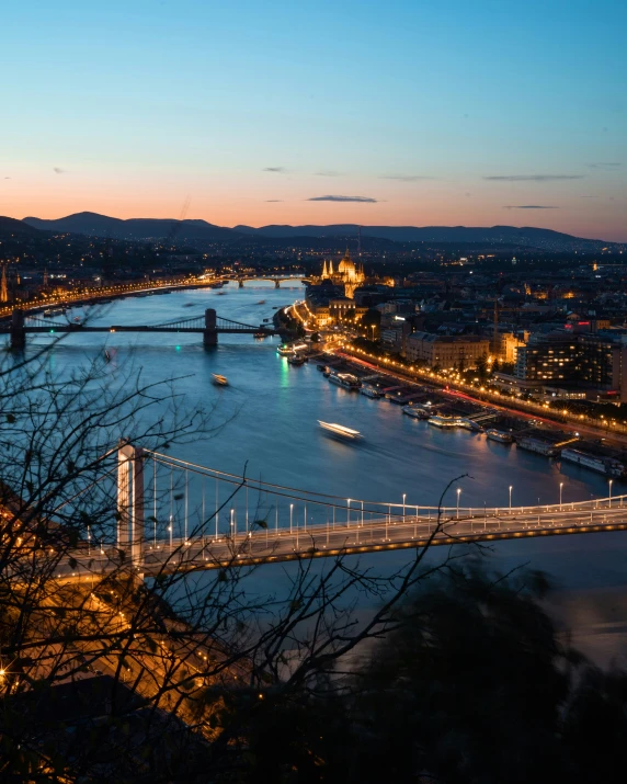 an aerial view of a city lit up at night